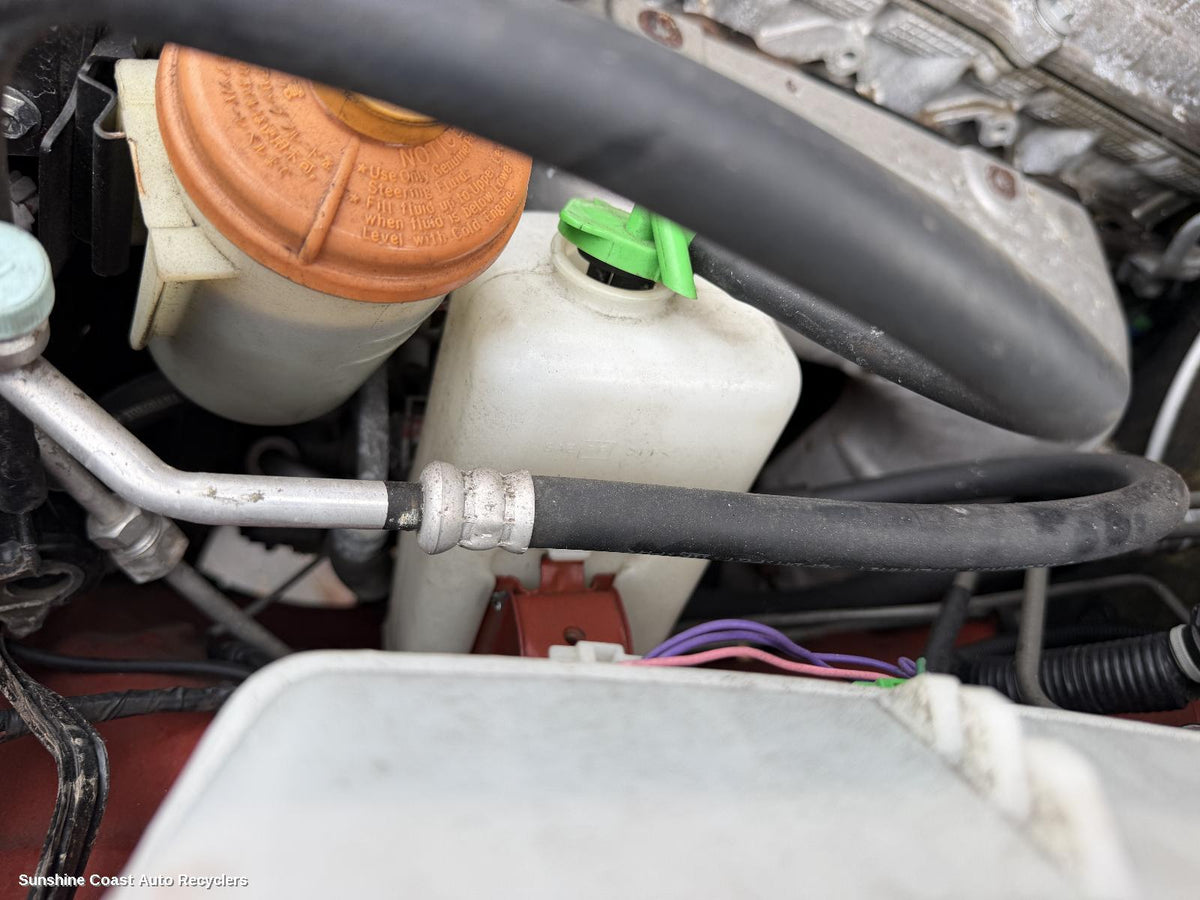 1998-2018 Suzuki Jimny Overflow Bottle