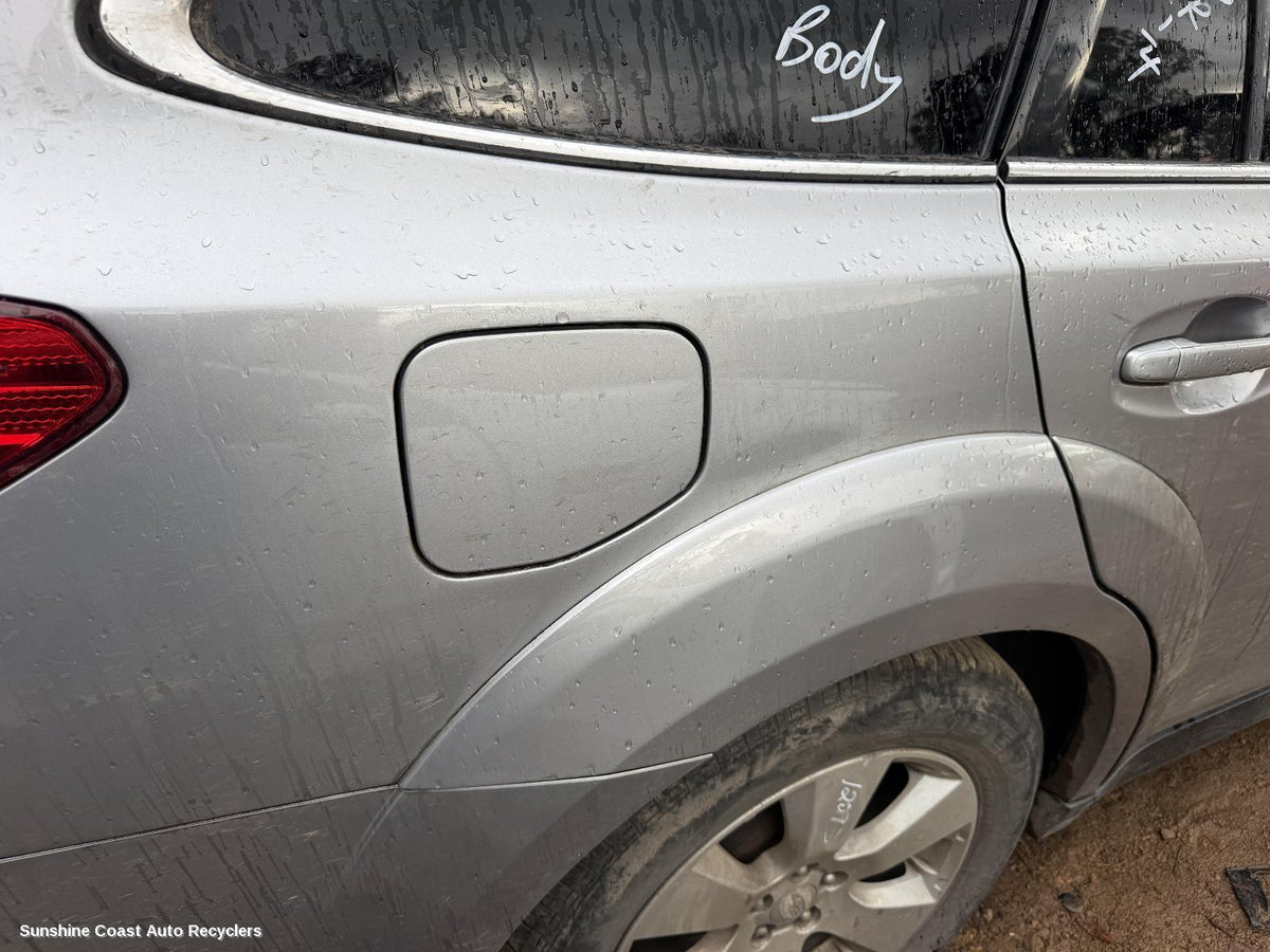 2009-2014 Subaru Outback Fuel Door Filler