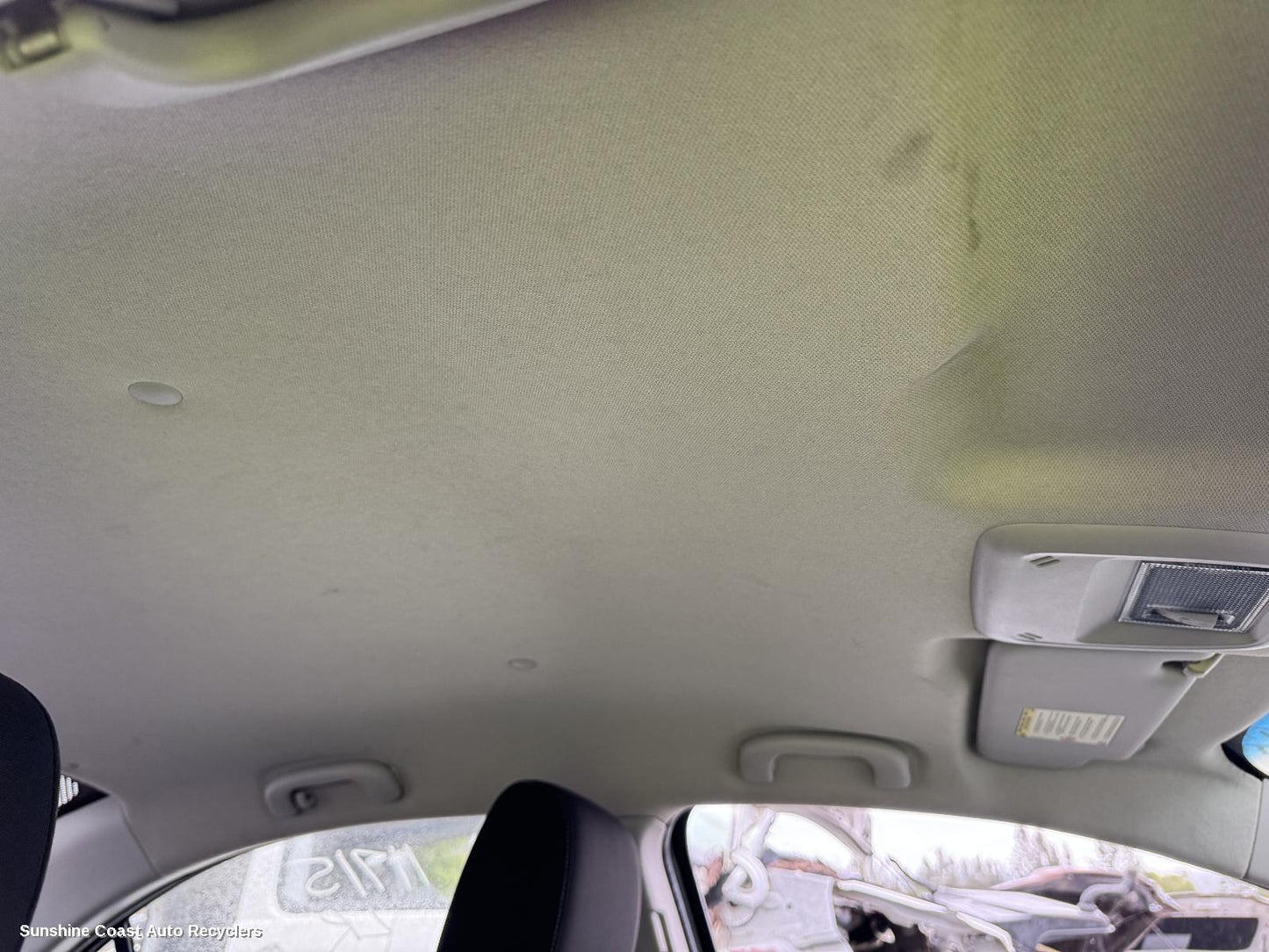 2013 Holden Barina Hoodlining