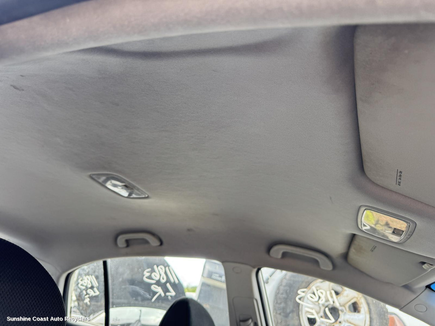 2007 Kia Rio Hoodlining