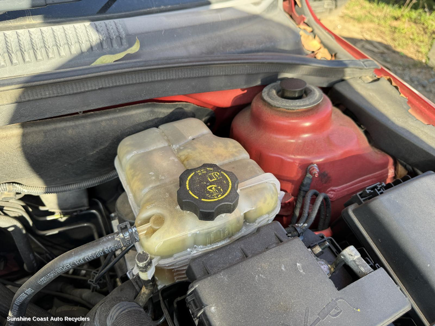 2014 Holden Cruze Overflow Bottle