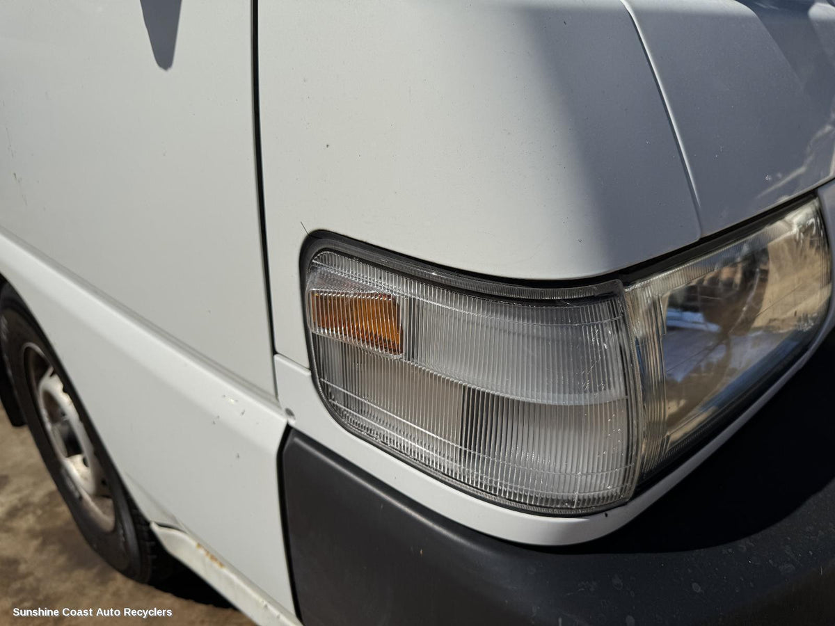 2000-2012 Mitsubishi L300 Right Headlight Surround