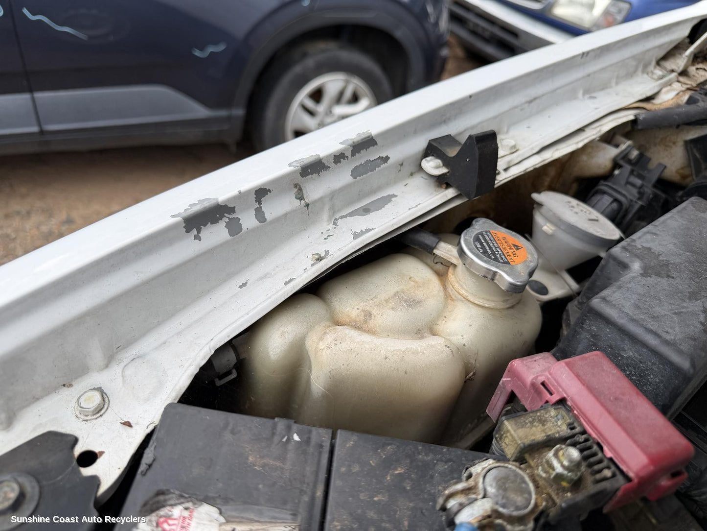 2011 Nissan Navara Overflow Bottle