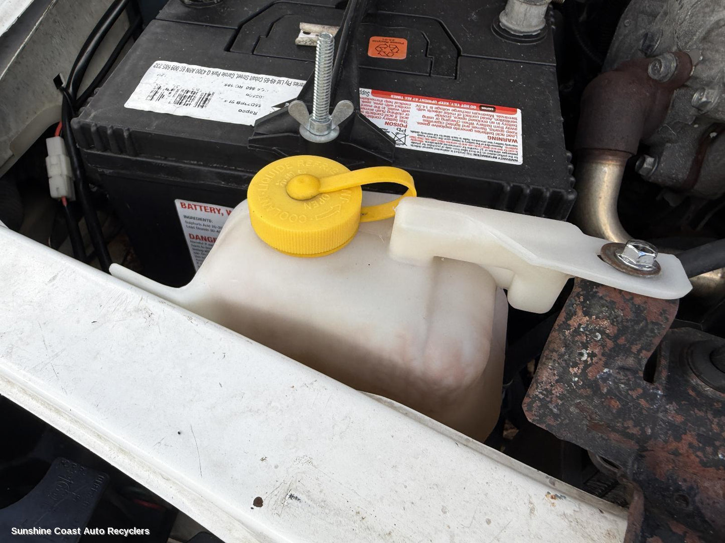 1997-2015 Nissan Navara Overflow Bottle