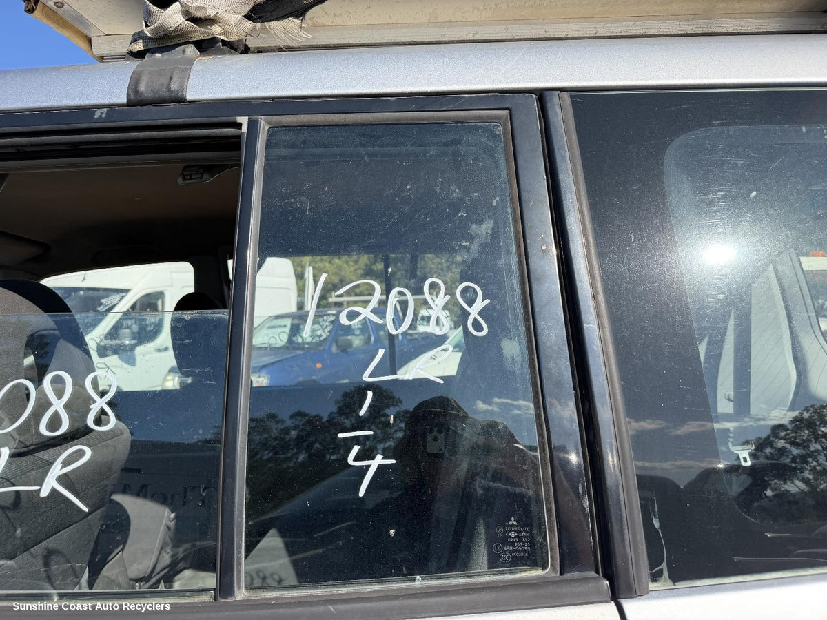 2000-2006 Mitsubishi Pajero Left Rear 1 4 Door Glass