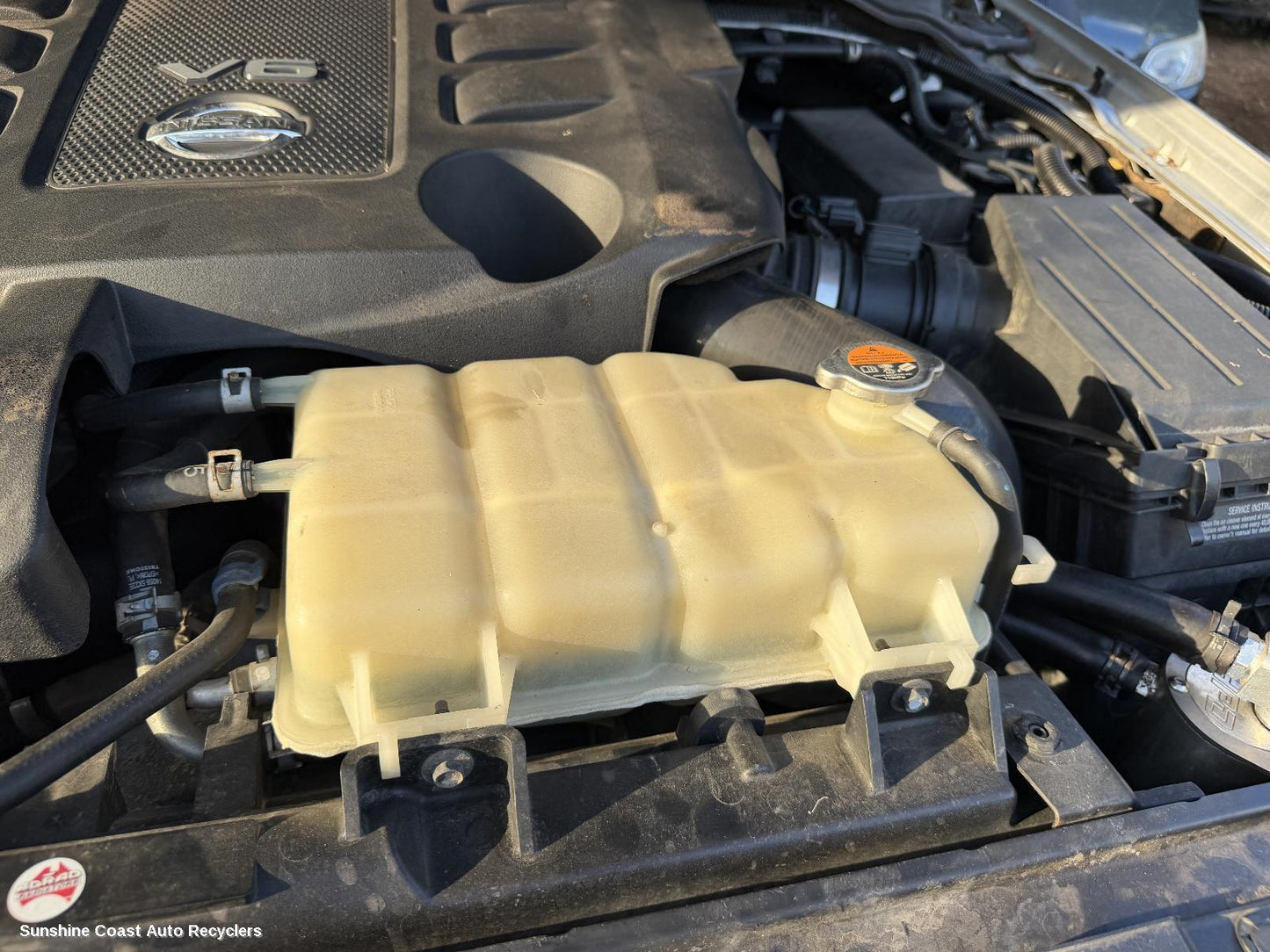 2010-2015 Nissan Navara Overflow Bottle