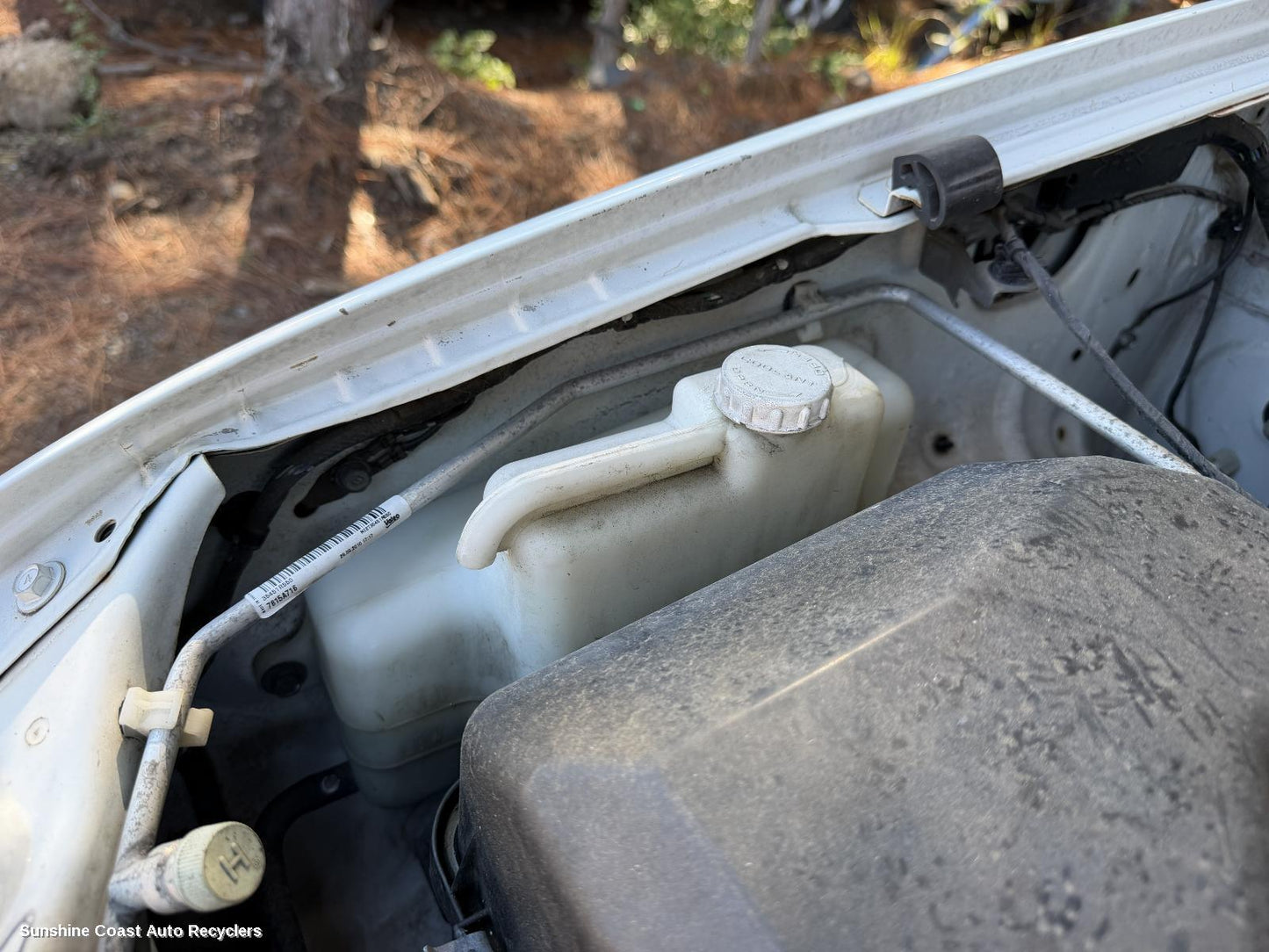 2006-2015 Mitsubishi Triton Overflow Bottle