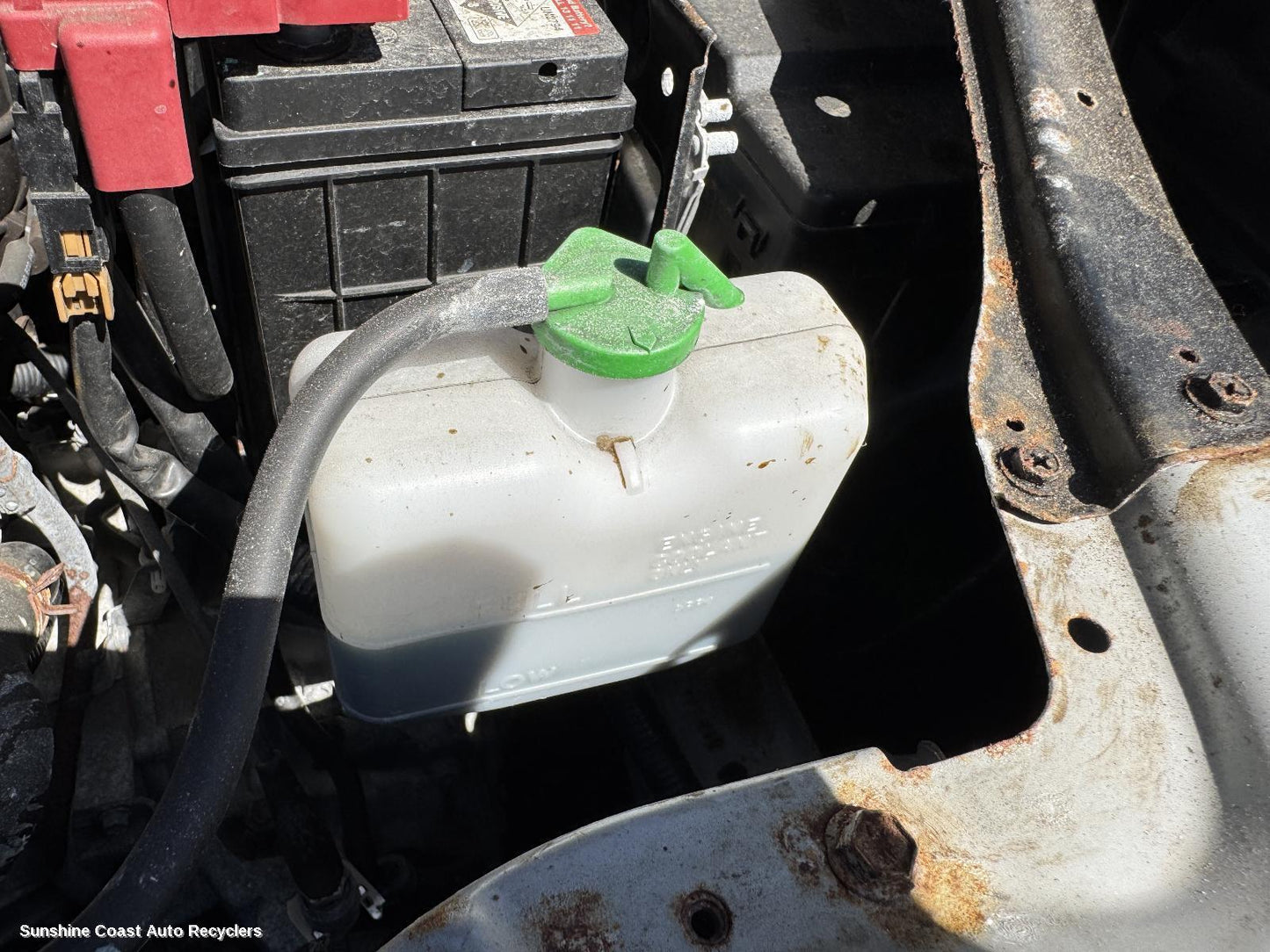 2014 Suzuki Swift Overflow Bottle