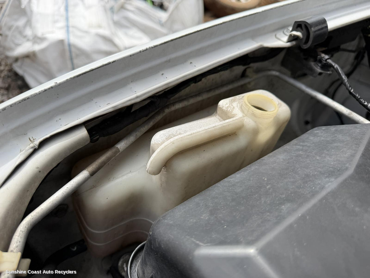 2006-2015 Mitsubishi Triton Overflow Bottle
