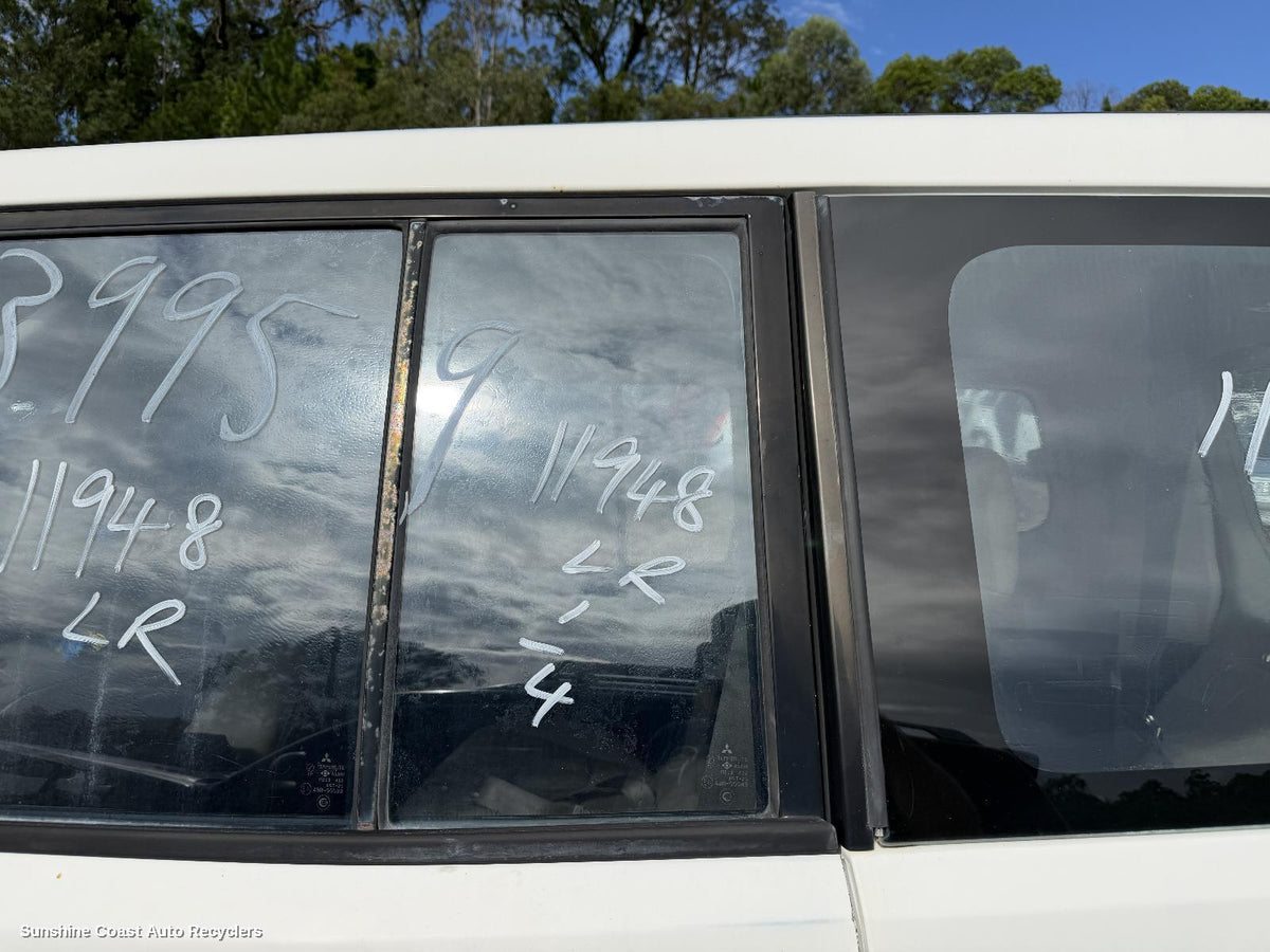 2000-2006 Mitsubishi Pajero Left Rear 1 4 Door Glass