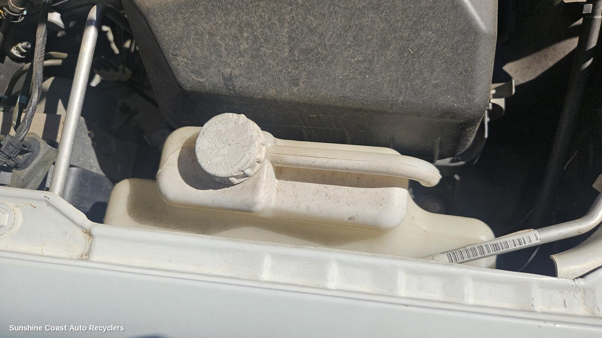 2006-2015 Mitsubishi Triton Overflow Bottle