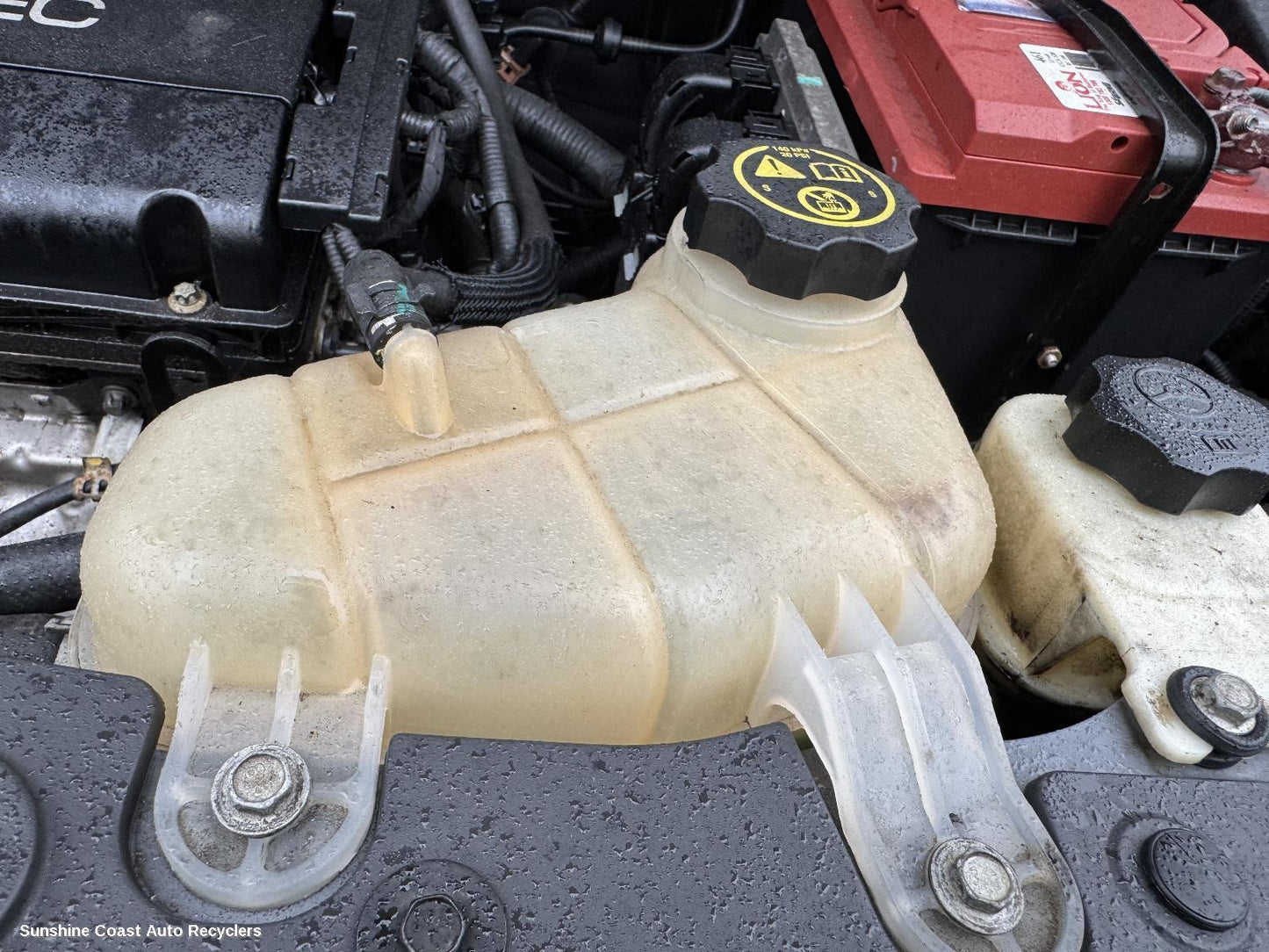 2013 Holden Barina Overflow Bottle