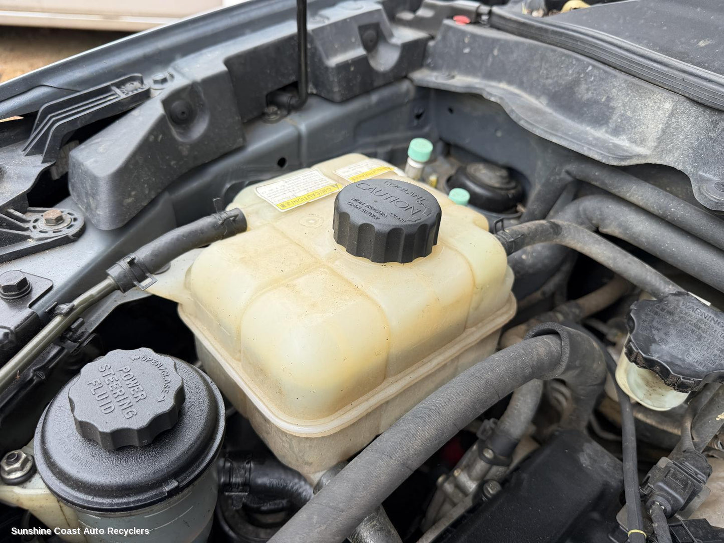 2011-2019 Ssangyong Korando Overflow Bottle