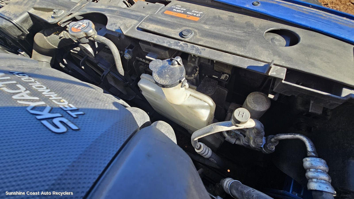 2014-2026 Mazda 2 Overflow Bottle